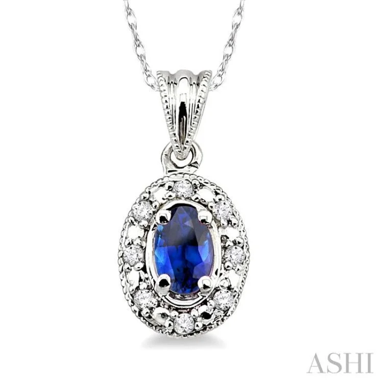 5x3mm Oval Shape Sapphire and 1/20 Ctw Single Cut Diamond Pendant in 10K White Gold with Chain.