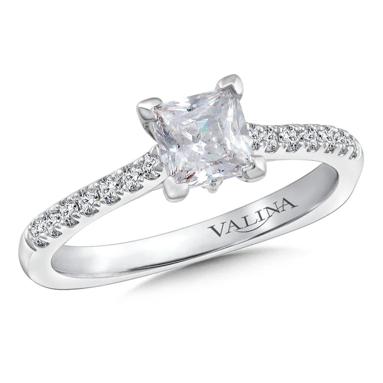 Diamond engagement ring mounting with side stones set in 14k white gold.