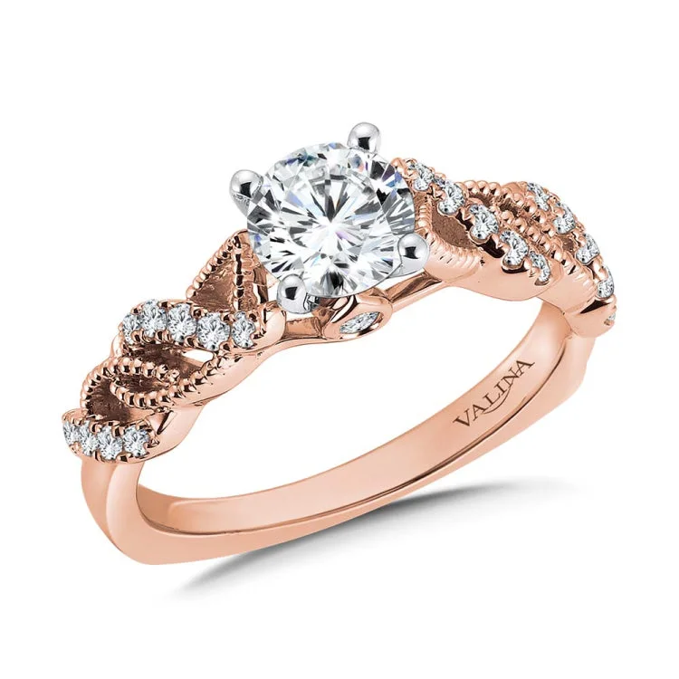 Diamond engagement ring mounting with beaded detailing and side stones set in 14k rose gold.