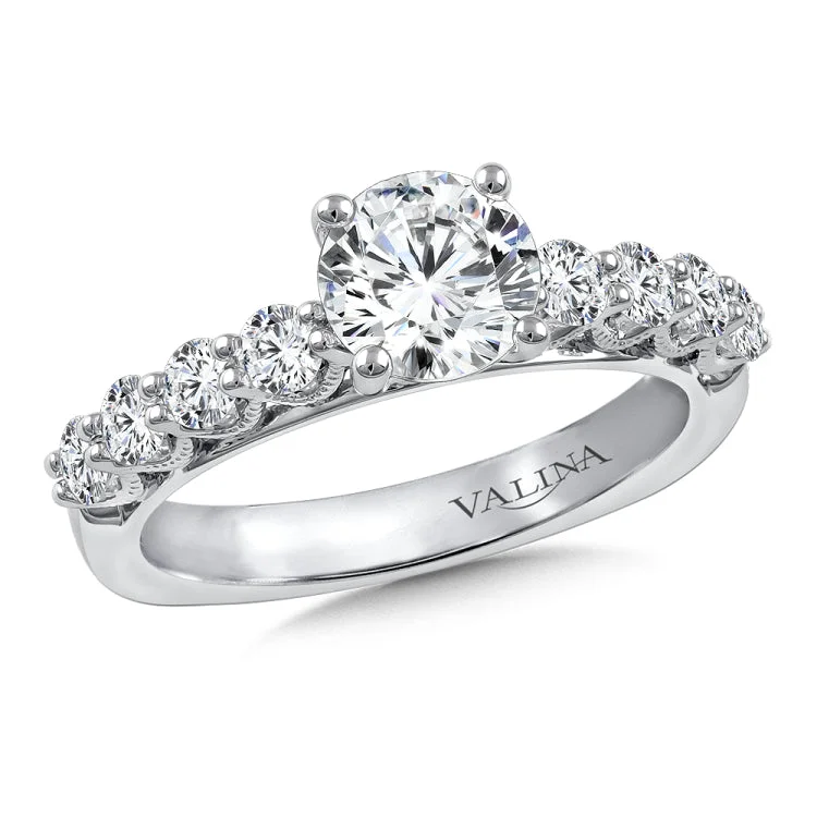 Diamond engagement ring mounting with milgrain detailing and side stones set in 14k white gold.