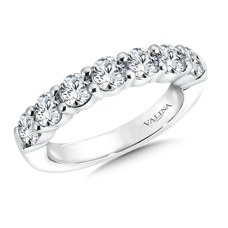 True fit matching diamond wedding band and a beautiful reminder of that special day for years to come.