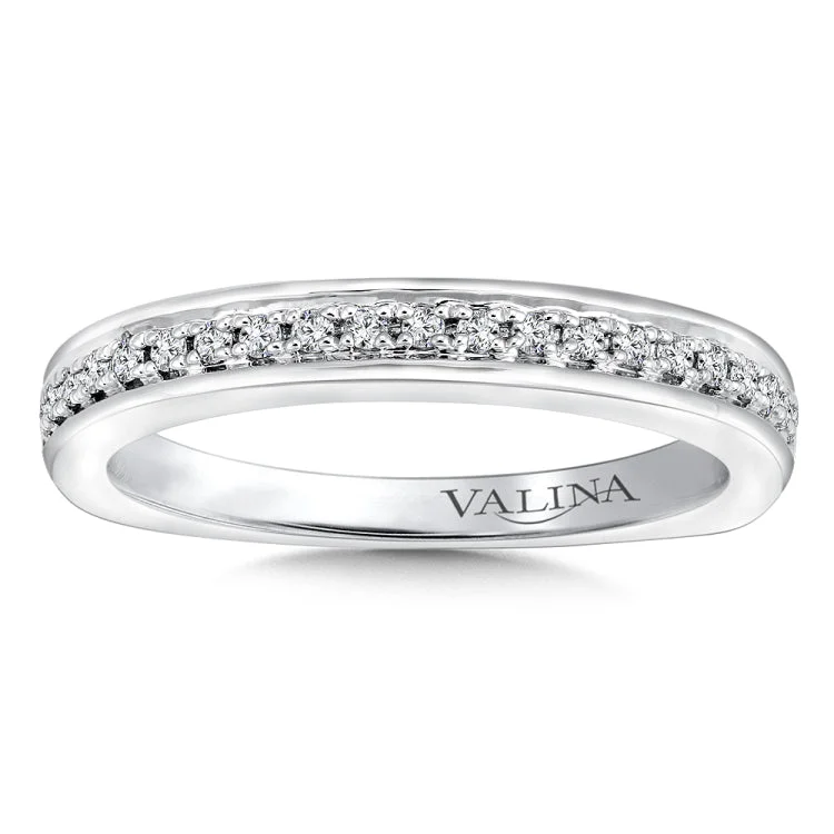 True fit matching diamond wedding band and a beautiful reminder of that special day for years to come.