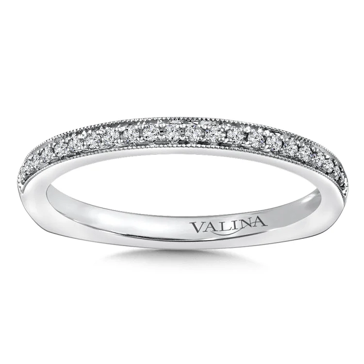 True fit matching diamond wedding band and a beautiful reminder of that special day for years to come.