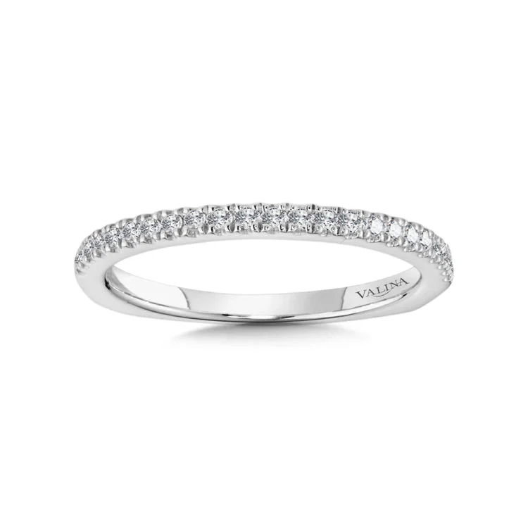 True fit matching diamond wedding band and a beautiful reminder of that special day for years to come.