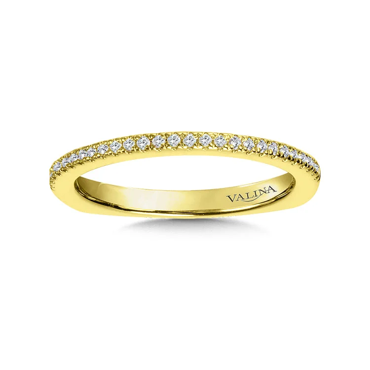 True fit matching diamond wedding band and a beautiful reminder of that special day for years to come.